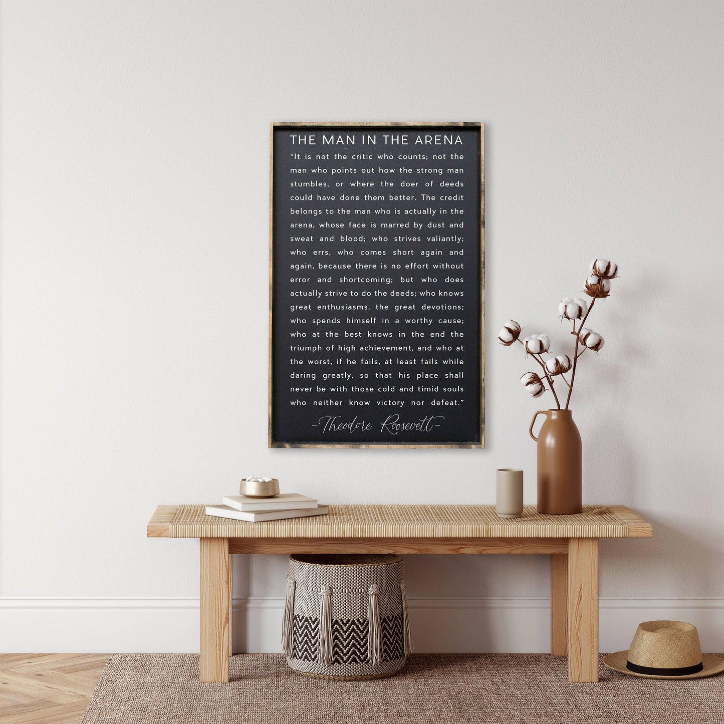 The Man in the Arena Wood Sign: White / 18” x 24”.