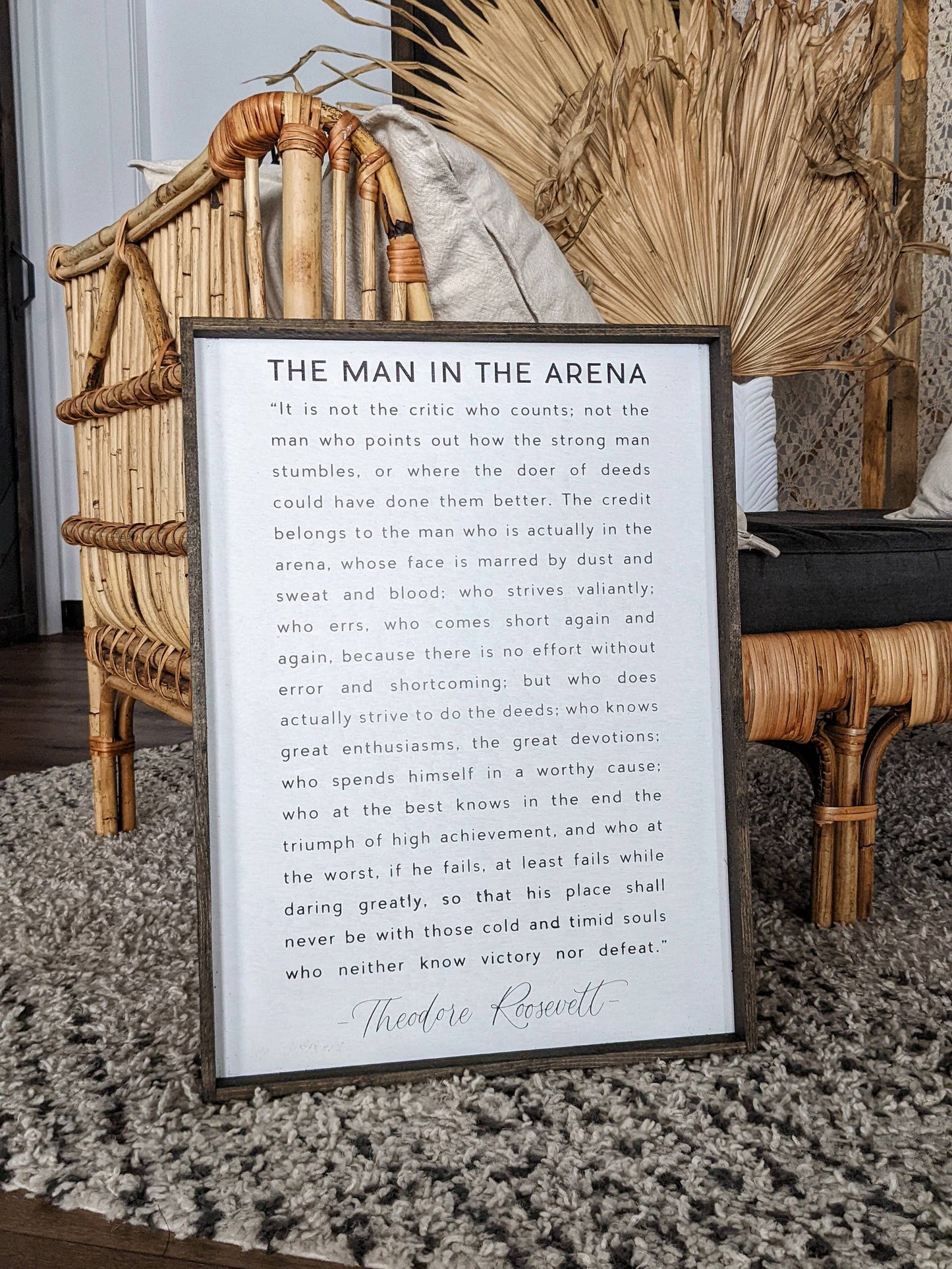 The Man in the Arena Wood Sign: White / 18” x 24”.