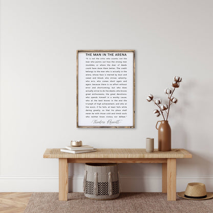 The Man in the Arena Wood Sign: White / 18” x 24”.