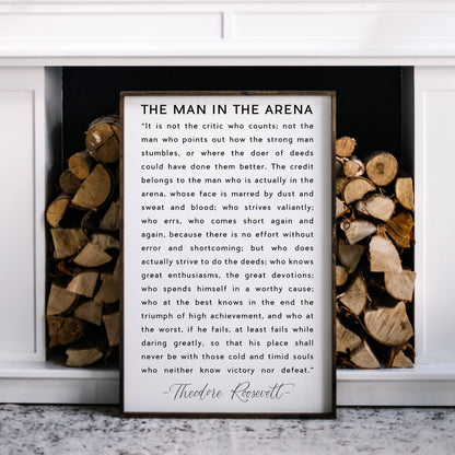 The Man in the Arena Wood Sign: White / 18” x 24”.